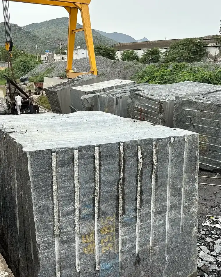 Granite block sawn into slabs at a processing yard