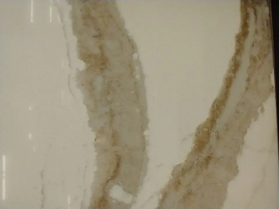 White quartz slab with soft brown veining
