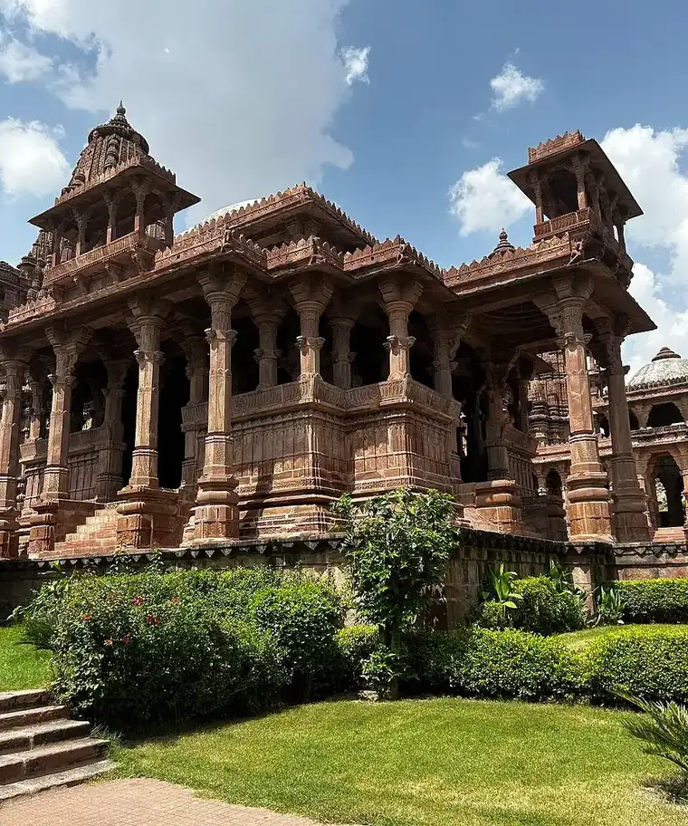 Carved red sandstone cenotaph at Mandore Gardens, Jodhpur, India